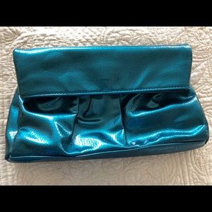 Steve Madden teal faux leather clutch